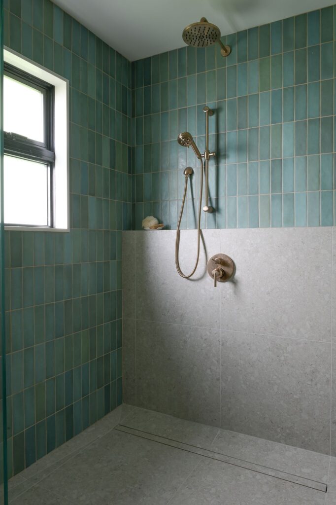 gold grout in bathroom tile.