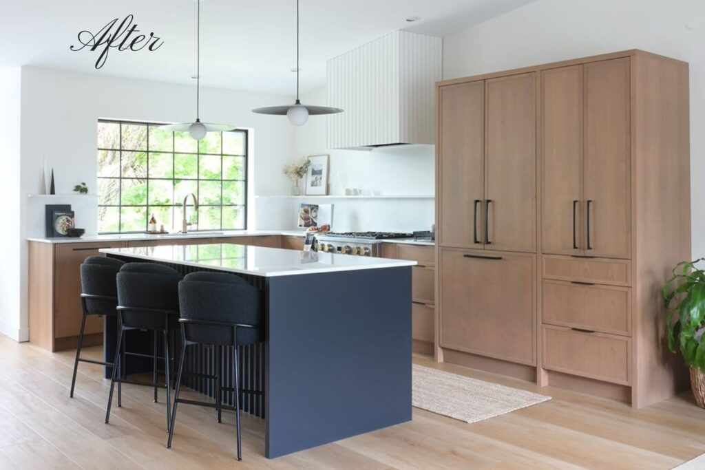 a renovated modern kitchen featuring a contrasting 