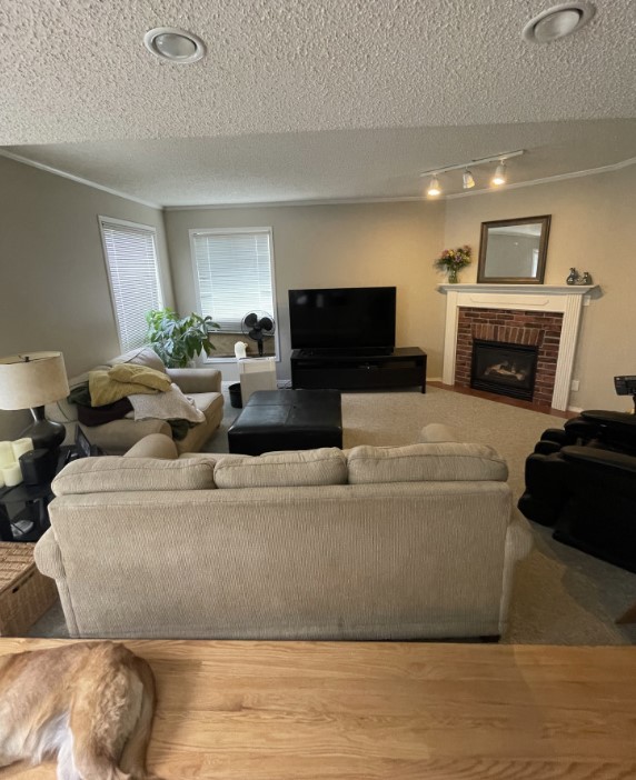 Hardwood into sunken carpeted living room